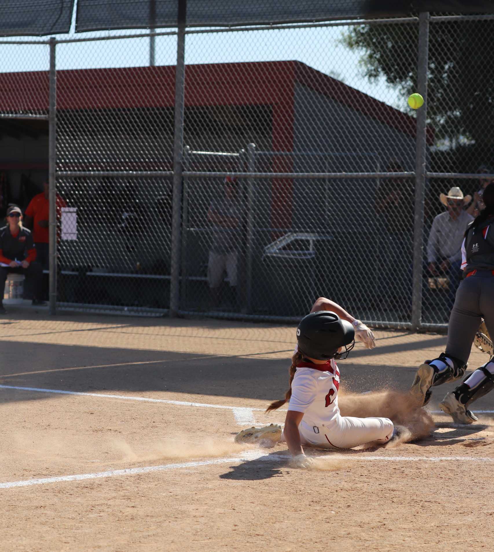 Morgan Meidam sliding into home